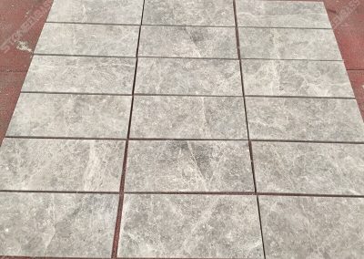 honed tundra grey marble tiles